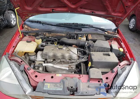 2004 Ford Focus Lx z USA, uszkodzony, nr VIN 1FAFP33PX4W121241